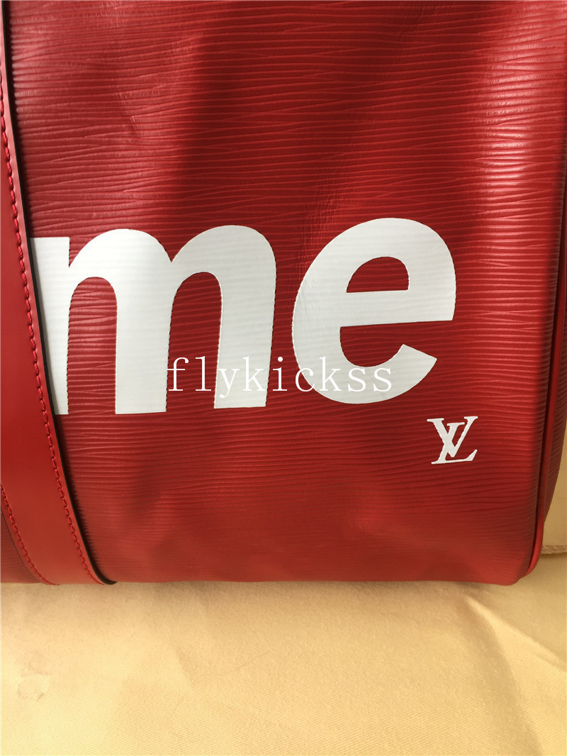 Supreme LVS Traveling Red Duffle Bag